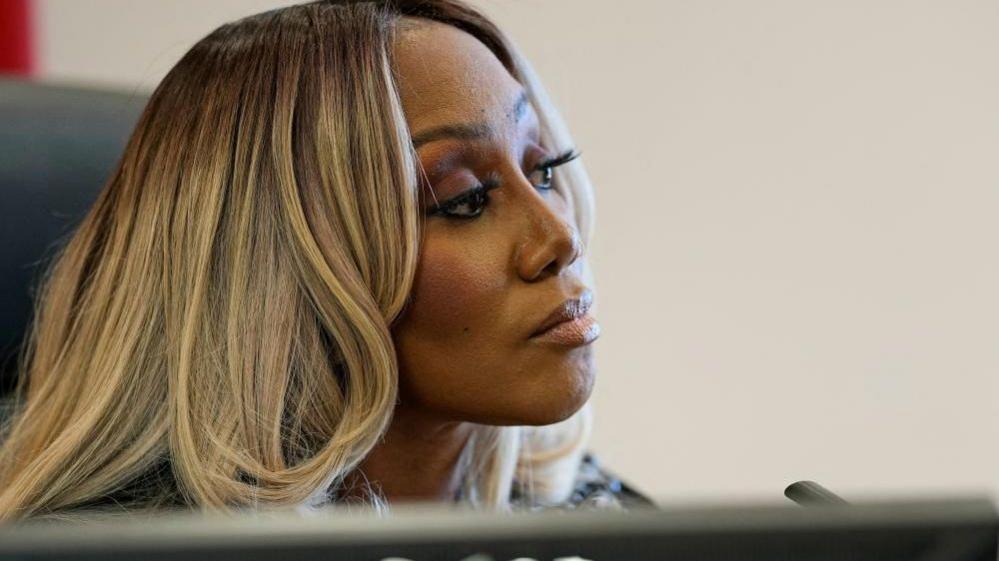 The judge seen listening to lawyers' arguments