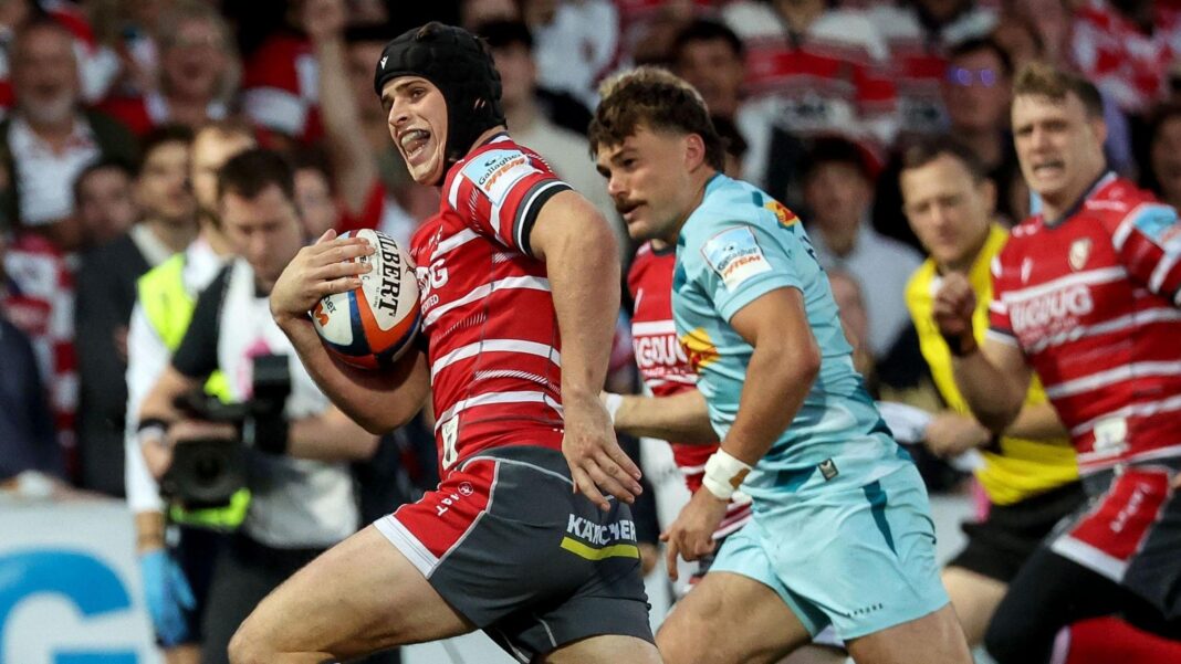 Gloucester thrash sorry Quins to go top of the Prem Gloucester's Seb Atkinson carrying the ball in his right hand while looking around before scoring for his side