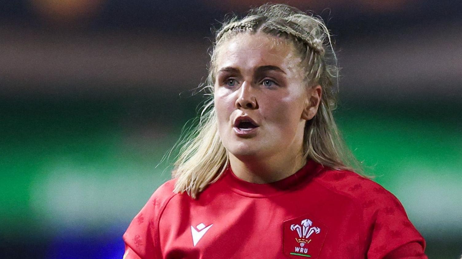 Alex Callender in Wales' red kit