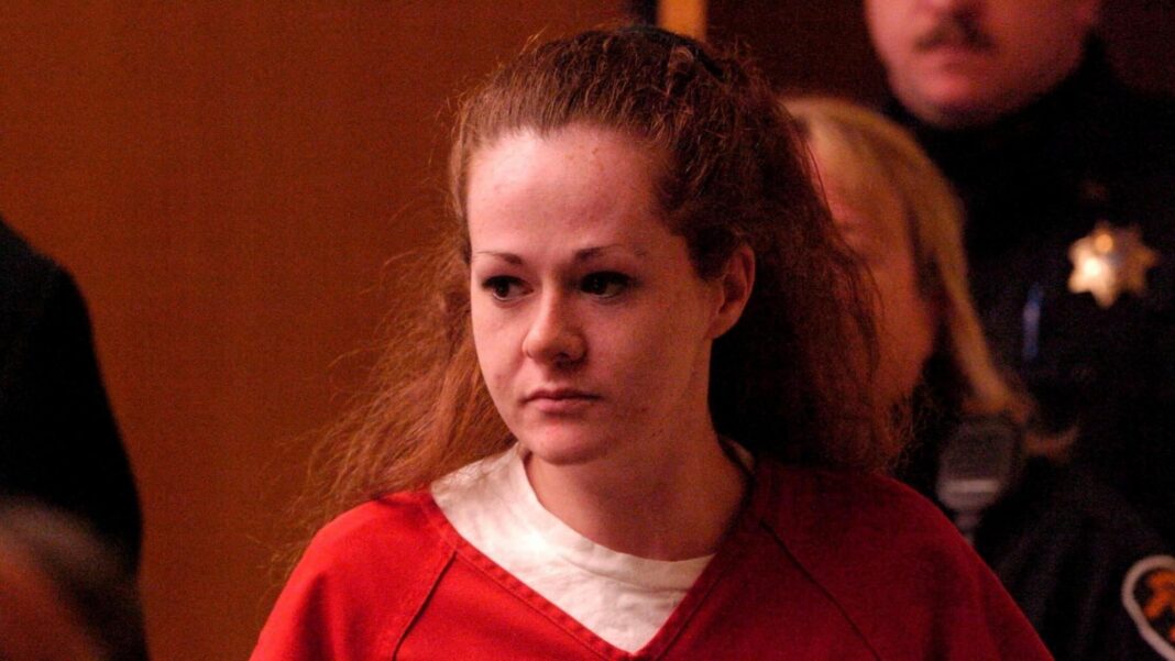 US murderer Christa Pike discharged from hospital 10 days after failed execution Christa Pike, a woman with red hair wears a white top with a red top on top