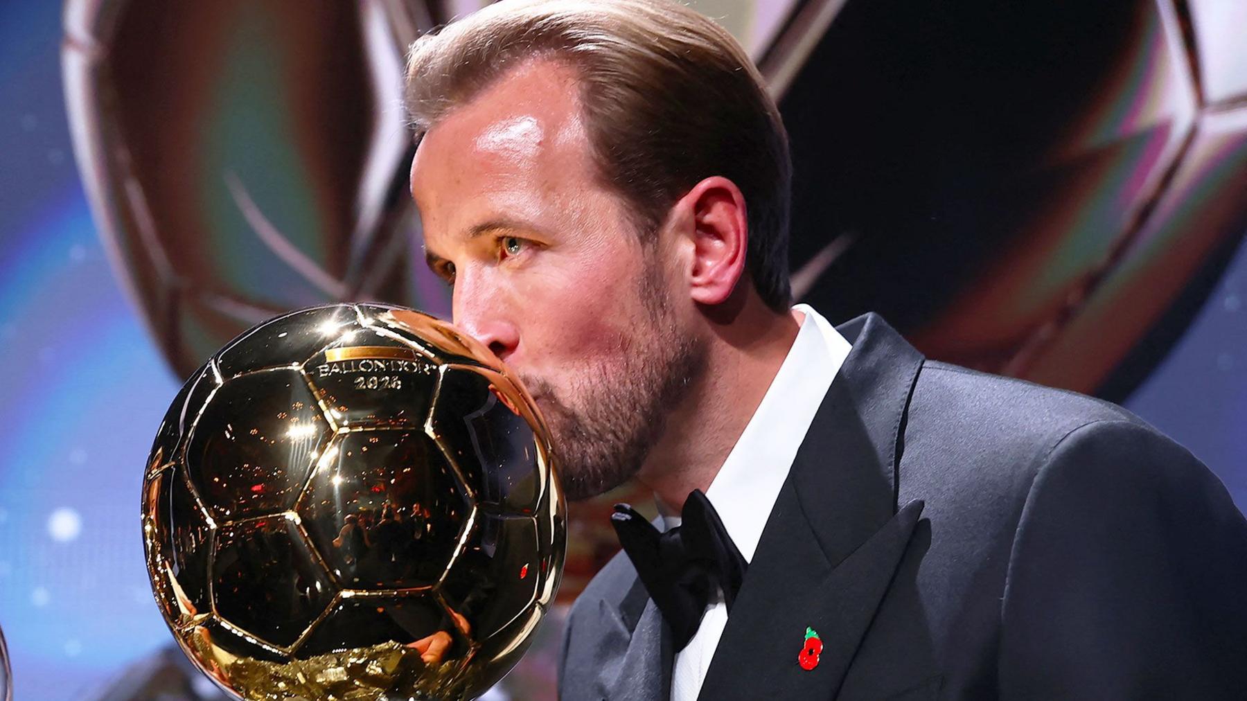 Harry Kane kisses the Ballon d'Or