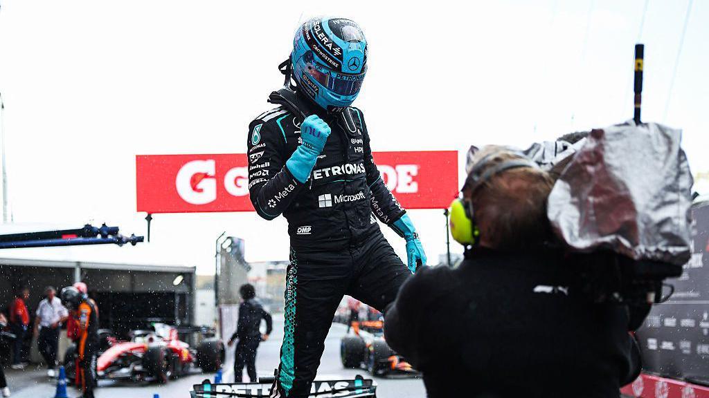 George Russell celebrates winning the srpint race Zandvoort