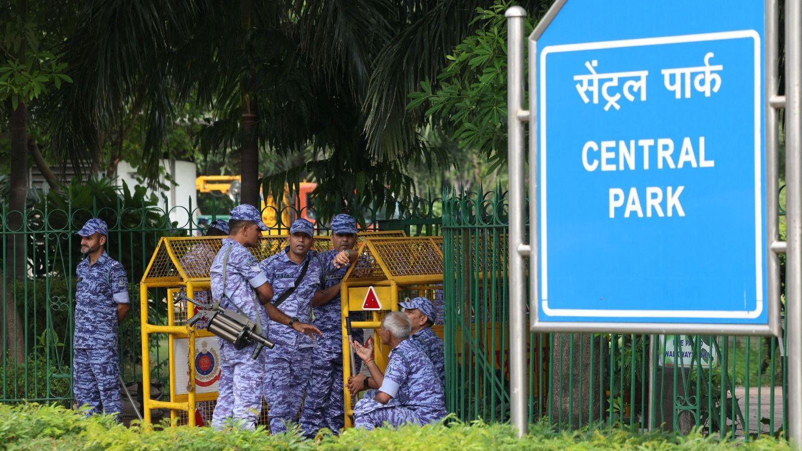 Security officers stand guard ahead of the flag rally announced by the Cockroach Janta Party (CJP) seeking the resignation of India's Chief Election Commissioner Gyanesh Kumar, near the protest site in New Delhi, India, October 16, 2026.
