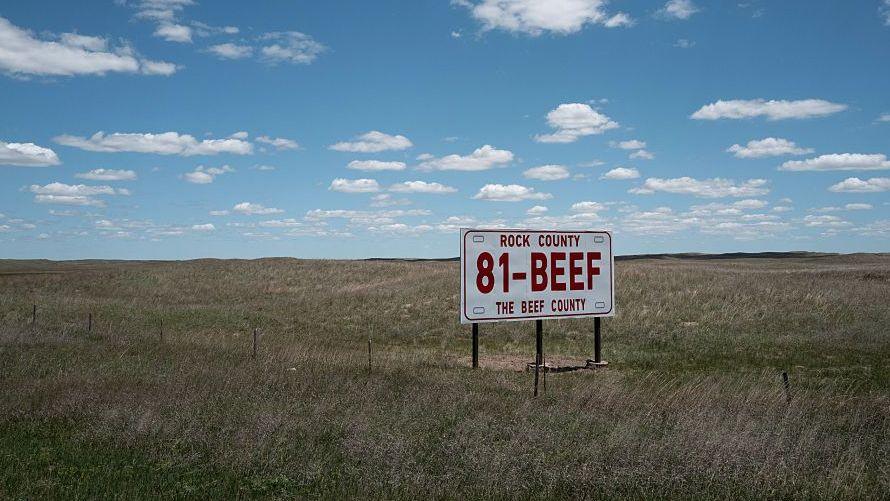 A billboard sits on a ranch on June 14, 2026 near Rose, Nebraska