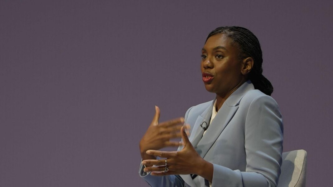 I’m a classic old school Conservative, says Kemi Badenoch Kemi Badenoch on stage at the Conservative Pary conference, speaking and gesturing with her hands. She is wearing a pale blue suit, with a white shirt and her hair is tied back.