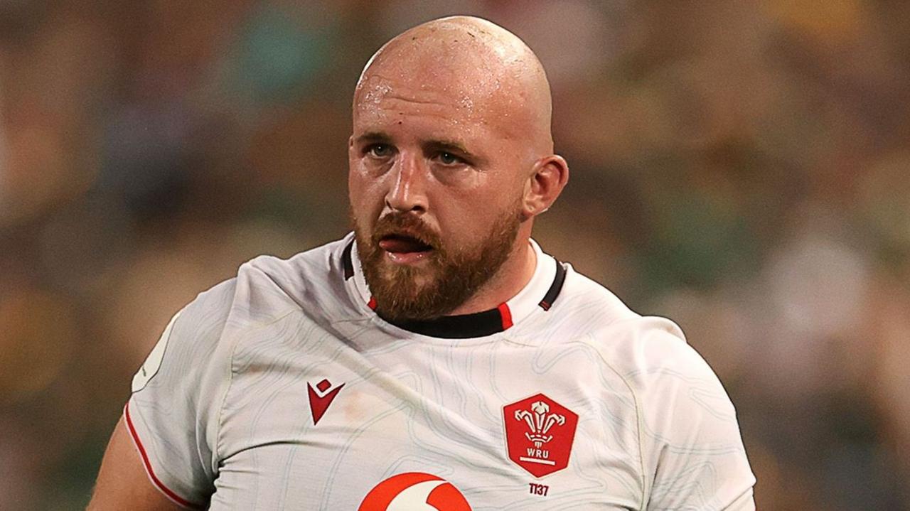 Dillon Lewis in a white Wales shirt against South Africa
