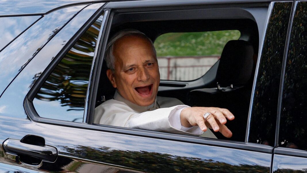 Pope’s South American trip to go ahead as planned after lung cancer surgery The pope waving out of a car window.