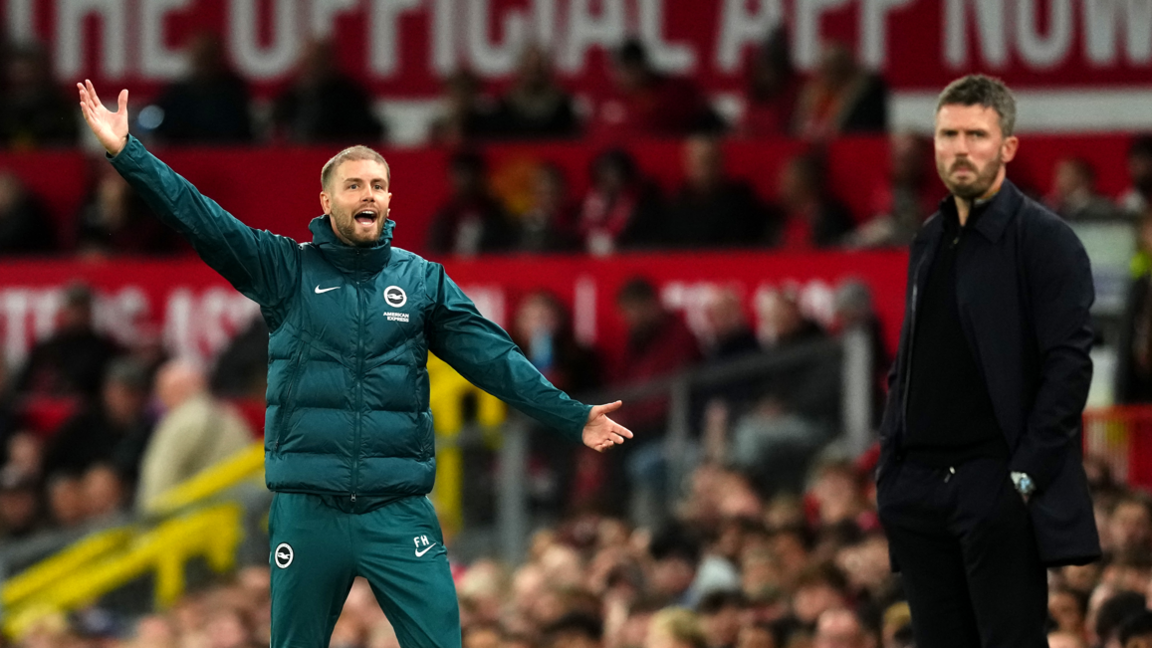 Brighton and Hove Albion manager Fabian Hurzeler (left) reacts on the touchline during the Carabao Cup tie at Old Trafford in September 2026