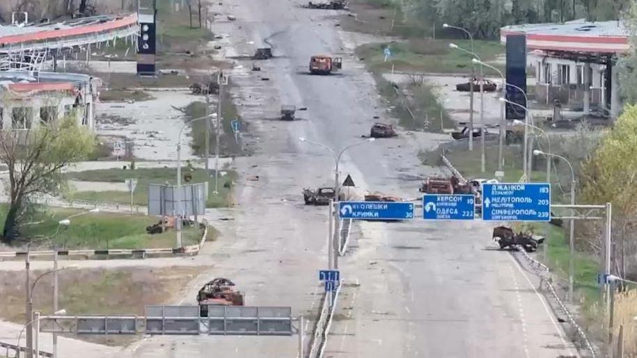 A still image taken from an undated drone video released September 24, 2026, shows destroyed vehicles sitting on a street in Oleshky, Kherson Region, Russian-controlled Ukraine.