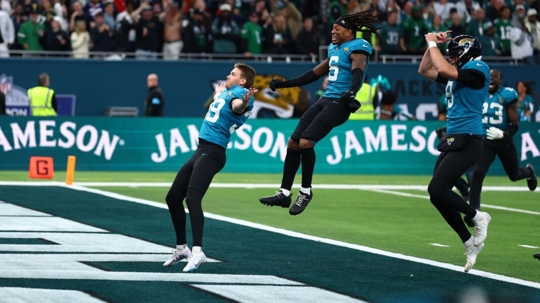 Jaguars stun Eagles with last-second win in London Cam Little stretches out his arms in celebration